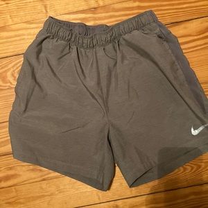 Nike light grey running shorts, size medium